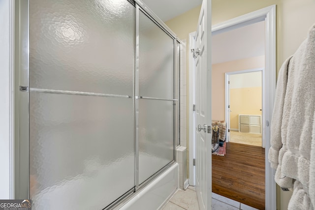 127 Chestnut Ln, Athens, GA 30606 - ensuite bathroom with bath / shower combo with glass door and tile patterned floors