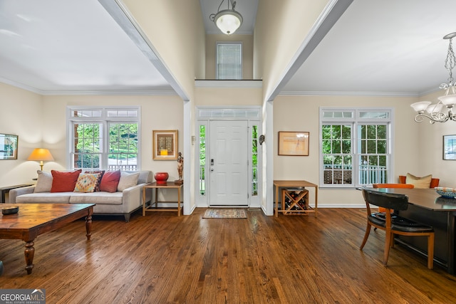 127 Chestnut Ln, Athens, GA 30606 - foyer entrance with a chandelier, crown molding, and wood finished floors
