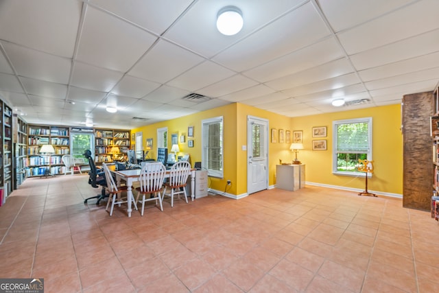 127 Chestnut Ln, Athens, GA 30606 - tiled dining area featuring a drop ceiling and healthy amount of natural light