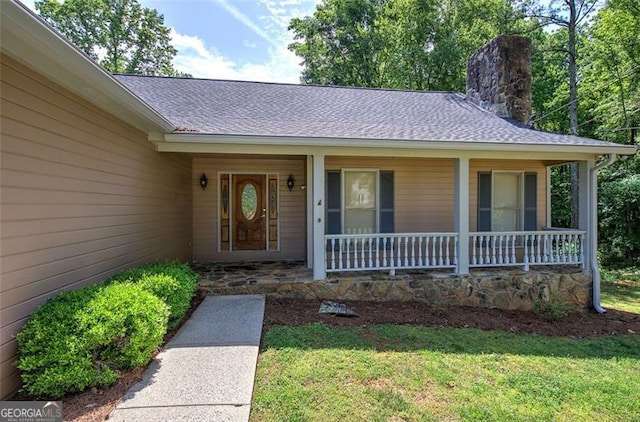 2652 Mount Tabor Church Rd, Dallas, GA 30157 - doorway to property featuring a porch, a chimney, roof with shingles, and a lawn