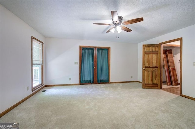 2652 Mount Tabor Church Rd, Dallas, GA 30157 - unfurnished room featuring light carpet, ceiling fan, baseboards, and a textured ceiling