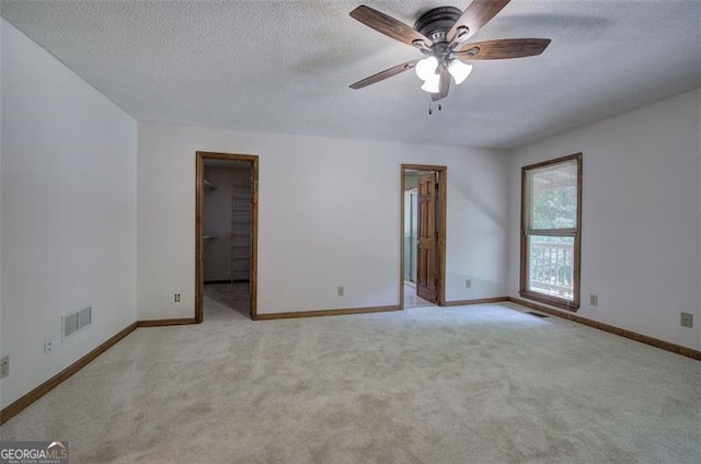 2652 Mount Tabor Church Rd, Dallas, GA 30157 - carpeted empty room featuring ceiling fan, a textured ceiling, and baseboards
