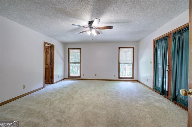 2652 Mount Tabor Church Rd, Dallas, GA 30157 - spare room with light colored carpet, ceiling fan, baseboards, and a textured ceiling