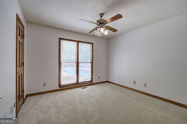 2652 Mount Tabor Church Rd, Dallas, GA 30157 - empty room with light colored carpet, a textured ceiling, ceiling fan, and baseboards