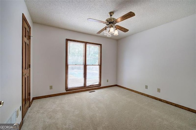 2652 Mount Tabor Church Rd, Dallas, GA 30157 - unfurnished room featuring light colored carpet, a textured ceiling, a ceiling fan, and baseboards