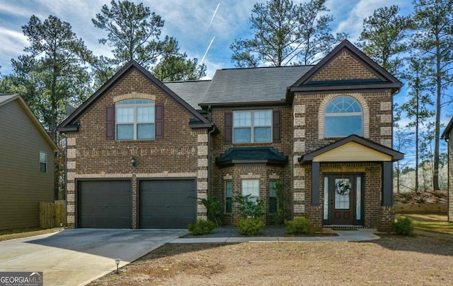 9941 Musket Ridge Cir, Jonesboro, GA 30238 - view of front of property with brick siding, an attached garage, driveway, and a shingled roof