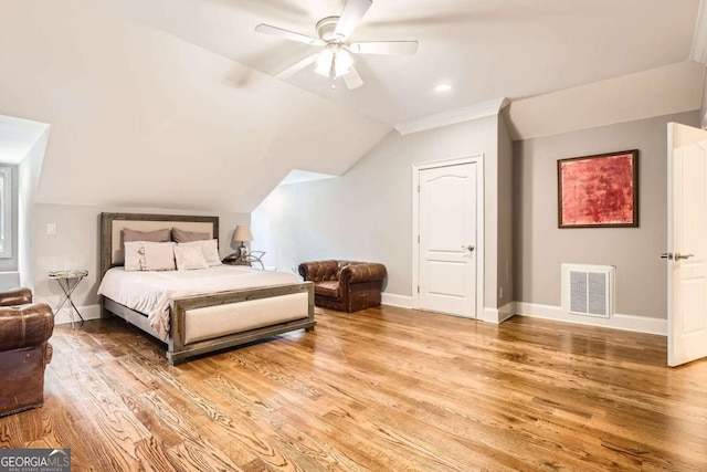790 Lakeview Ave NE, Atlanta, GA 30308 - bedroom with baseboards, wood finished floors, lofted ceiling, and a ceiling fan