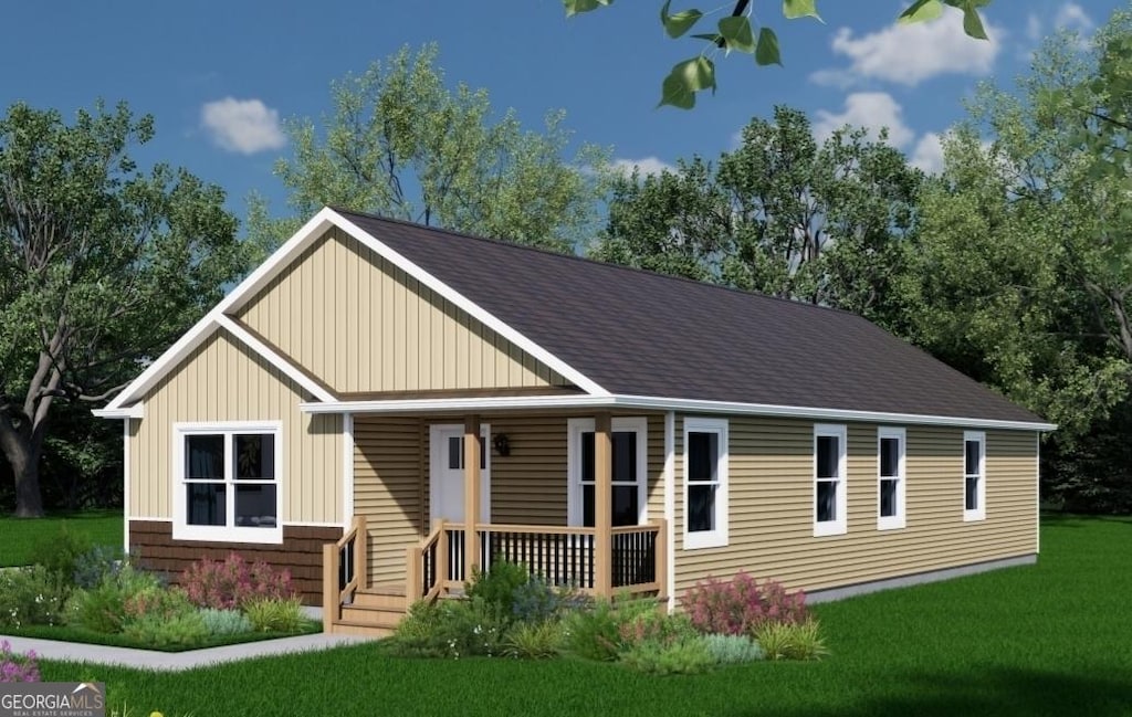 106 Sarah Kate Way, Gordon, GA 31031 - view of front of home featuring covered porch, a front lawn, and a shingled roof