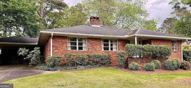 894 Nottingham Dr, Avondale Estates, GA 30002 - view of front of house with a chimney, a front lawn, brick siding, and a shingled roof