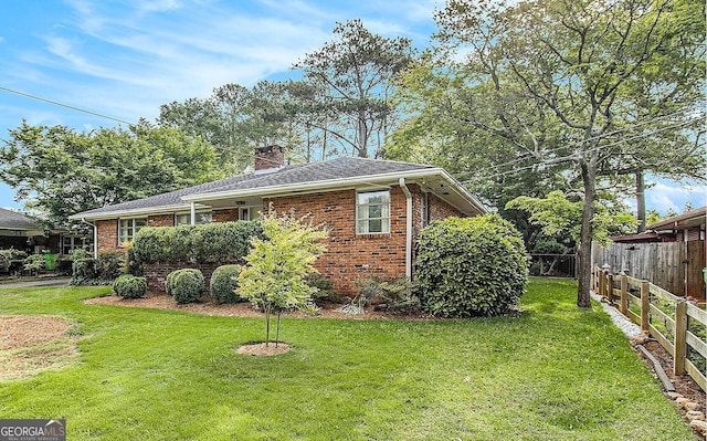 894 Nottingham Dr, Avondale Estates, GA 30002 - view of side of property featuring a chimney and brick siding