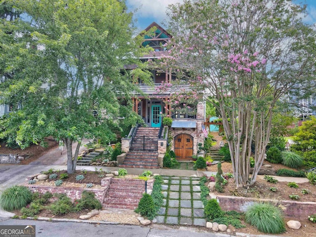 victorian house featuring stairway