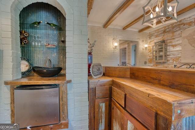 407 E 3rd St, Rome, GA 30161 - bathroom featuring beamed ceiling, a chandelier, and vanity