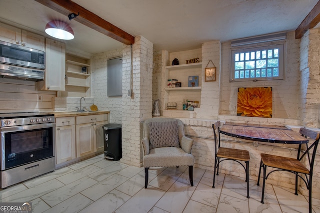 kitchen with appliances with stainless steel finishes, open shelves, light marble finish floors, beamed ceiling, and light countertops