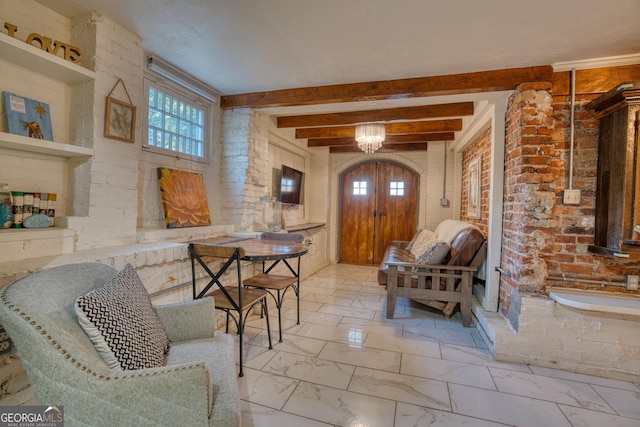 407 E 3rd St, Rome, GA 30161 - entryway with healthy amount of natural light, beam ceiling, and marble finish floors