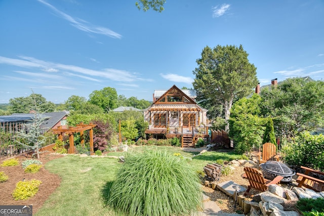 407 E 3rd St, Rome, GA 30161 - view of yard featuring a fire pit, a wooden deck, and a pergola