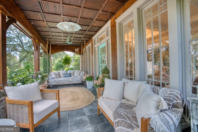 view of patio / terrace with an outdoor hangout area and covered porch