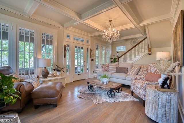 407 E 3rd St, Rome, GA 30161 - living area featuring wood-type flooring, a chandelier, coffered ceiling, beam ceiling, and stairway