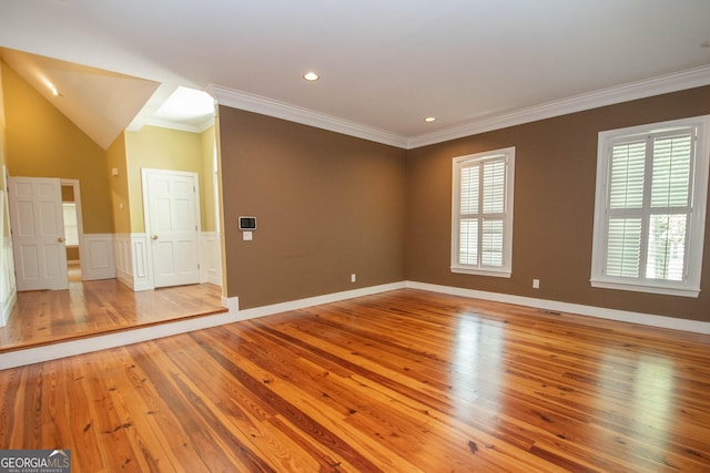 24 Overbrook Ct, Newnan, GA 30263 - empty room with light wood-style floors, ornamental molding, recessed lighting, and lofted ceiling