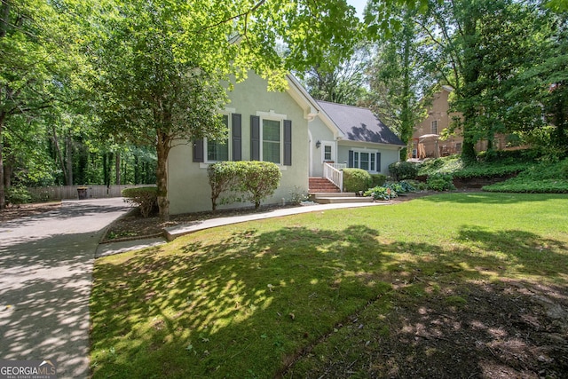 24 Overbrook Ct, Newnan, GA 30263 - view of front of home featuring stucco siding and a front yard
