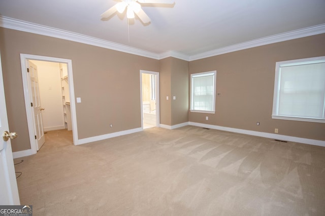 24 Overbrook Ct, Newnan, GA 30263 - unfurnished bedroom with ornamental molding, light carpet, baseboards, a spacious closet, and ensuite bath