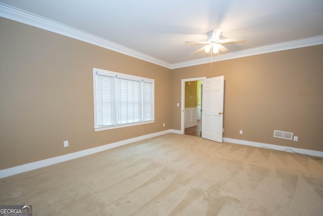 24 Overbrook Ct, Newnan, GA 30263 - spare room featuring crown molding, a ceiling fan, baseboards, and light carpet
