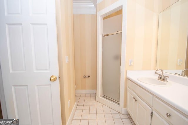 24 Overbrook Ct, Newnan, GA 30263 - bathroom with a shower stall, vanity, tile patterned floors, and baseboards