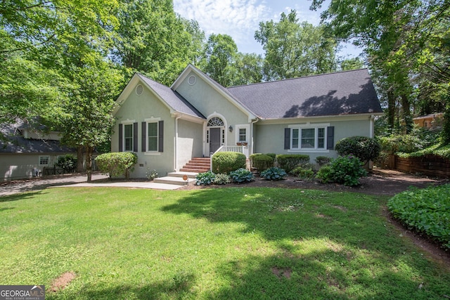 24 Overbrook Ct, Newnan, GA 30263 - ranch-style house featuring stucco siding, a front lawn, and a shingled roof