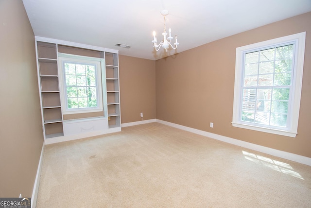 24 Overbrook Ct, Newnan, GA 30263 - spare room with baseboards, a chandelier, and light colored carpet