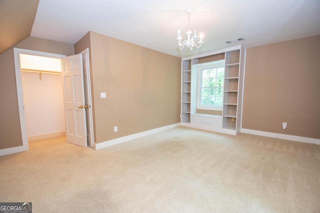 24 Overbrook Ct, Newnan, GA 30263 - unfurnished bedroom featuring a chandelier, light colored carpet, and baseboards