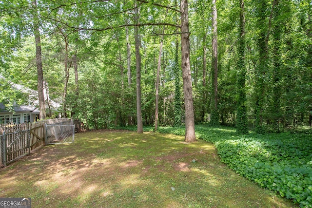 24 Overbrook Ct, Newnan, GA 30263 - view of yard featuring fence and a view of trees