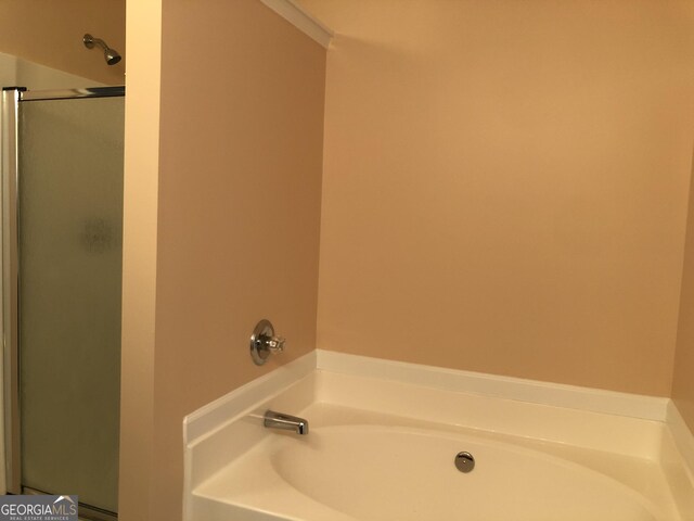 1938 Dilcrest Dr, Duluth, GA 30096 - bathroom featuring a garden tub and an enclosed shower