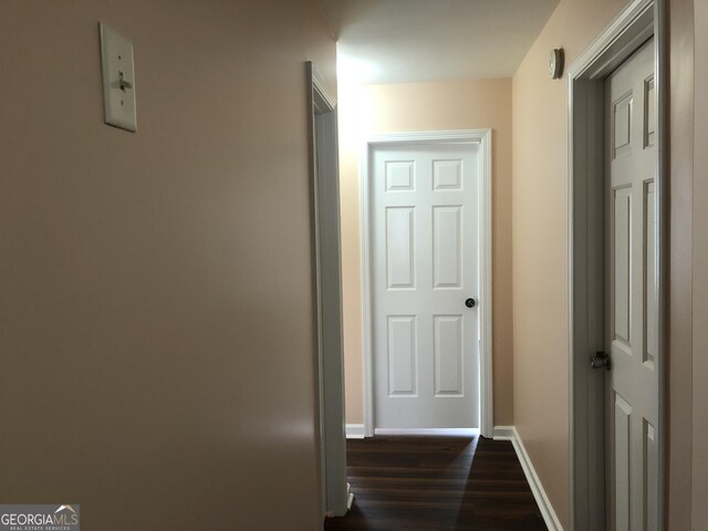 1938 Dilcrest Dr, Duluth, GA 30096 - corridor featuring dark wood-style flooring and baseboards