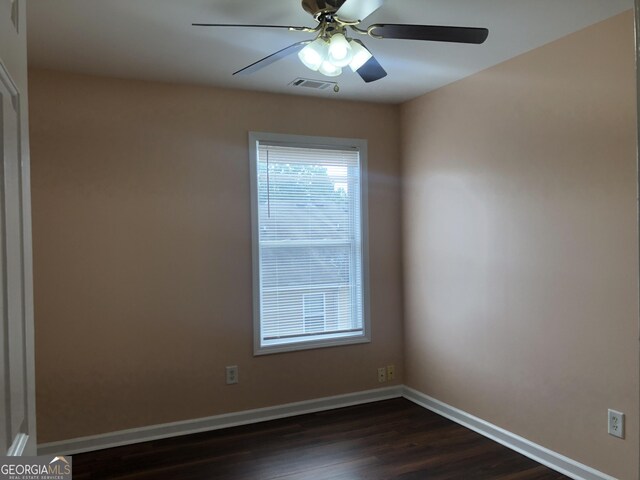 1938 Dilcrest Dr, Duluth, GA 30096 - unfurnished room with dark wood finished floors, baseboards, and ceiling fan