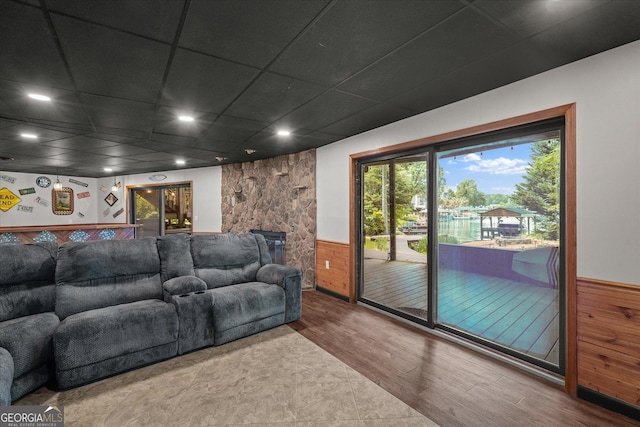 9020 Lakeview Pkwy, Villa Rica, GA 30180 - home theater featuring wood finished floors, a wainscoted wall, recessed lighting, and wood walls