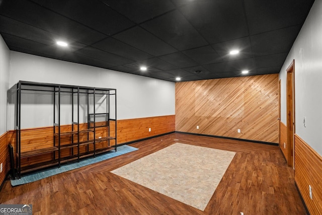 9020 Lakeview Pkwy, Villa Rica, GA 30180 - spare room featuring wood walls, wainscoting, wood finished floors, and recessed lighting