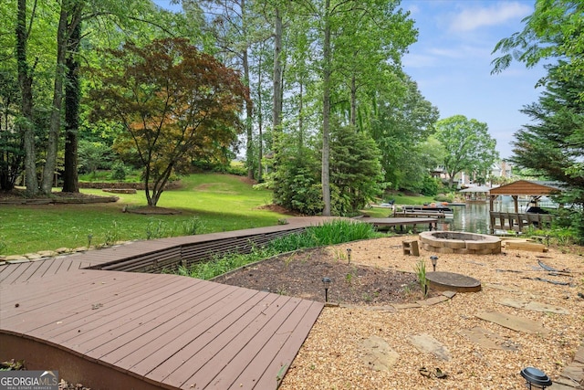 9020 Lakeview Pkwy, Villa Rica, GA 30180 - view of grassy yard with an outdoor fire pit