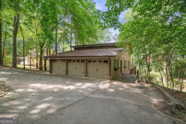 9020 Lakeview Pkwy, Villa Rica, GA 30180 - view of front of house with driveway and an attached garage