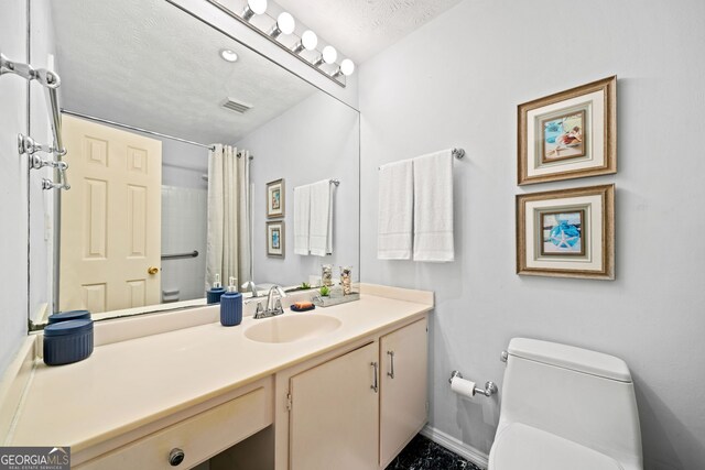 1260 Willeo Creek Dr, Roswell, GA 30075 - bathroom featuring vanity, a shower with curtain, and a textured ceiling