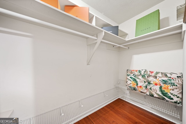 1260 Willeo Creek Dr, Roswell, GA 30075 - spacious closet featuring wood finished floors