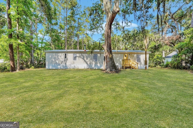 27 Pocahontas Rd, Midway, GA 31320 - view of green lawn
