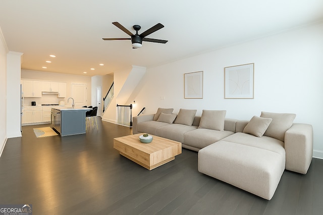 2282 Mclean Chase SE, Smyrna, GA 30080 - living room with a ceiling fan, ornamental molding, dark wood-style floors, recessed lighting, and baseboards