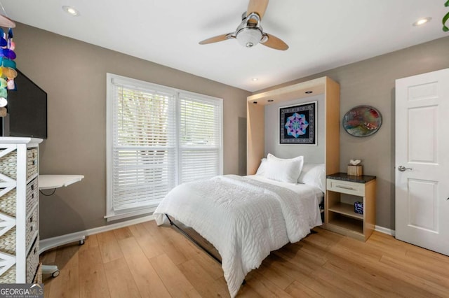 1141 Moorestown Cir, Decatur, GA 30033 - bedroom with light wood-style floors, ceiling fan, and recessed lighting