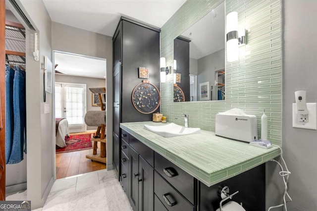 1141 Moorestown Cir, Decatur, GA 30033 - ensuite bathroom with vanity and decorative backsplash