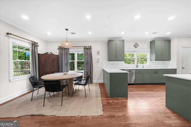2324 Oakview Rd NE, Atlanta, GA 30317 - kitchen featuring stainless steel dishwasher, light countertops, tasteful backsplash, baseboards, and recessed lighting