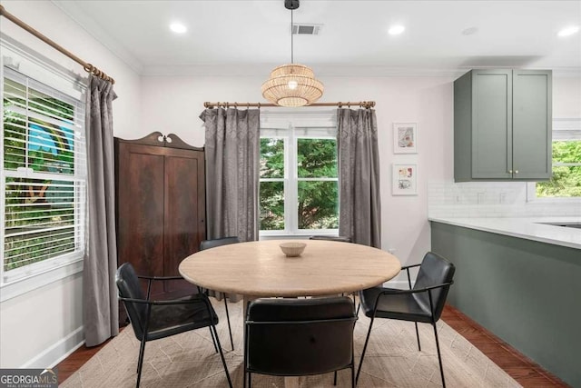 2324 Oakview Rd NE, Atlanta, GA 30317 - dining space featuring wood finished floors, recessed lighting, and crown molding