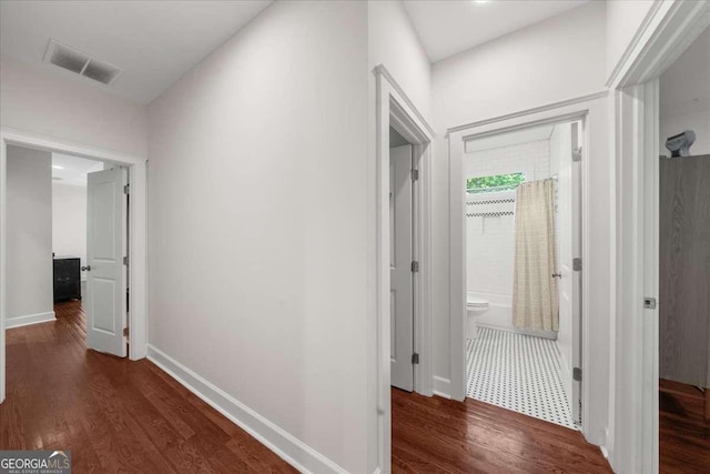 2324 Oakview Rd NE, Atlanta, GA 30317 - corridor featuring wood finished floors and baseboards