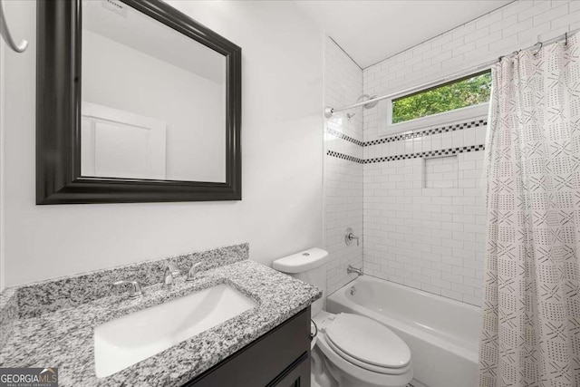 2324 Oakview Rd NE, Atlanta, GA 30317 - bathroom with toilet, vanity, and shower / tub combo