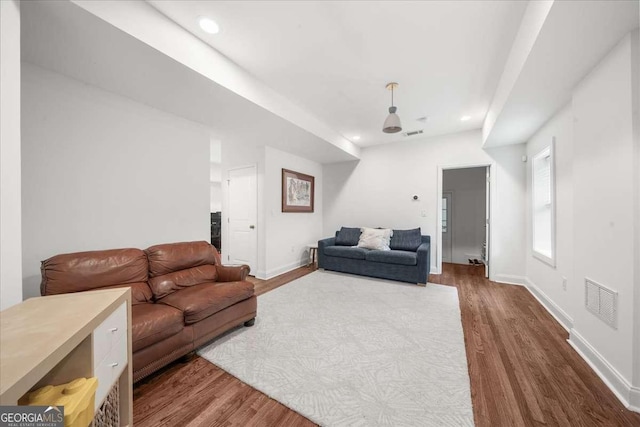 2324 Oakview Rd NE, Atlanta, GA 30317 - living area featuring dark wood finished floors, recessed lighting, and baseboards