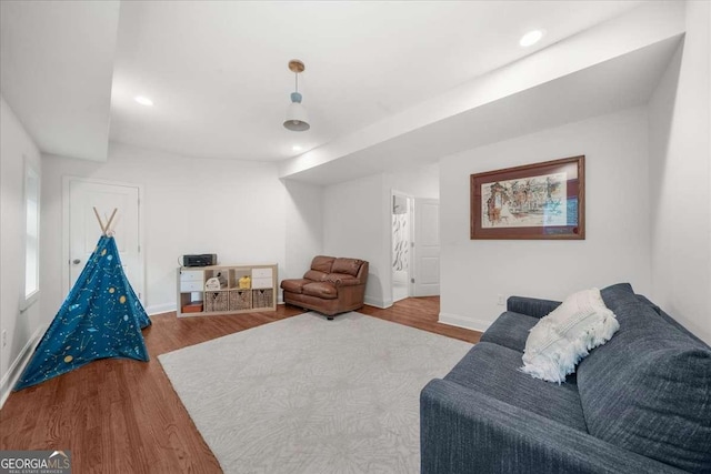 2324 Oakview Rd NE, Atlanta, GA 30317 - living room featuring wood finished floors, baseboards, and recessed lighting