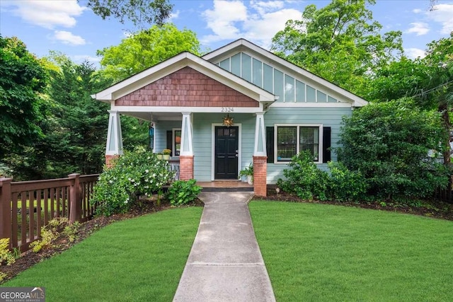 2324 Oakview Rd NE, Atlanta, GA 30317 - craftsman house featuring a porch and board and batten siding